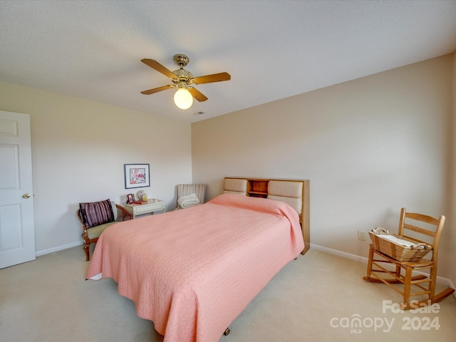 8510 Olive Branch Rd, Marshville, NC 28103 - bedroom with light carpet, baseboards, and a ceiling fan