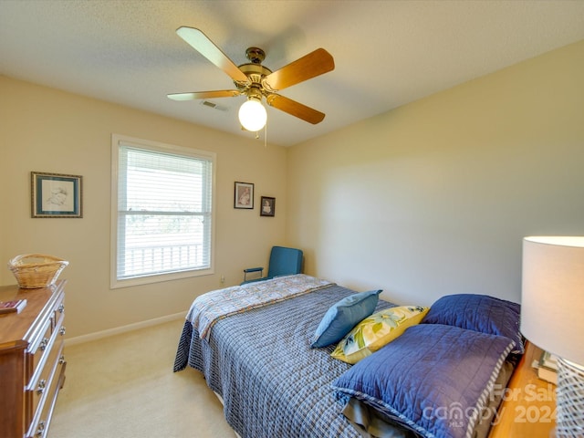 8510 Olive Branch Rd, Marshville, NC 28103 - bedroom with baseboards, a ceiling fan, and light colored carpet