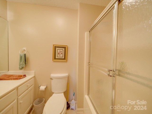 8510 Olive Branch Rd, Marshville, NC 28103 - bathroom featuring vanity, toilet, and a textured ceiling