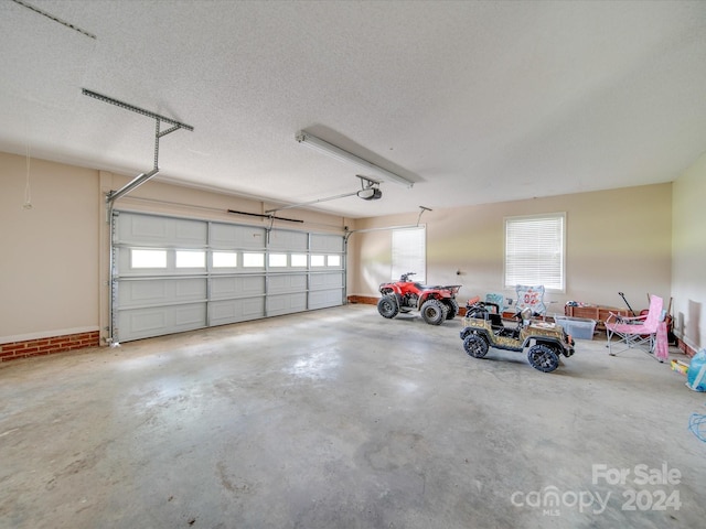 8510 Olive Branch Rd, Marshville, NC 28103 - garage featuring a garage door opener