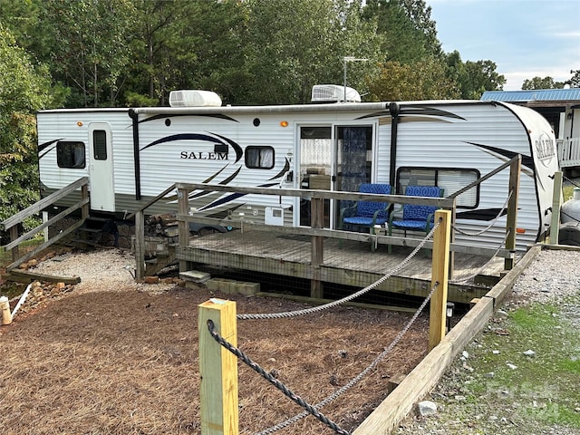 view of dock featuring a wooden deck