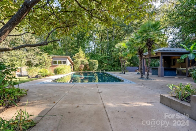 pool featuring a patio