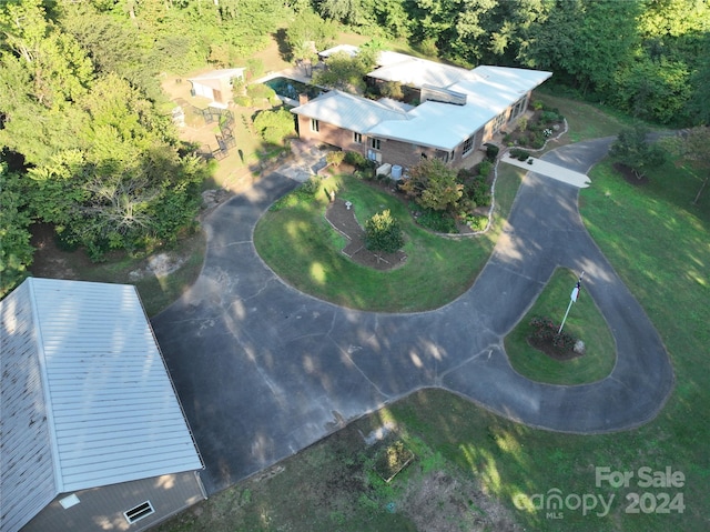 aerial view with a wooded view