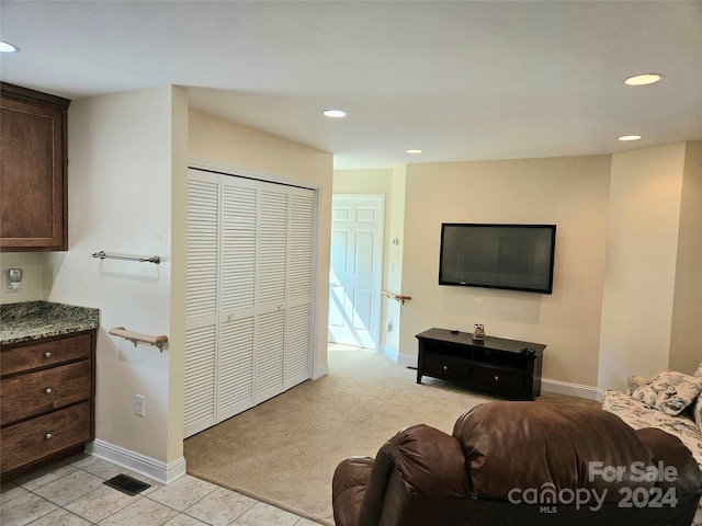 living room featuring light colored carpet