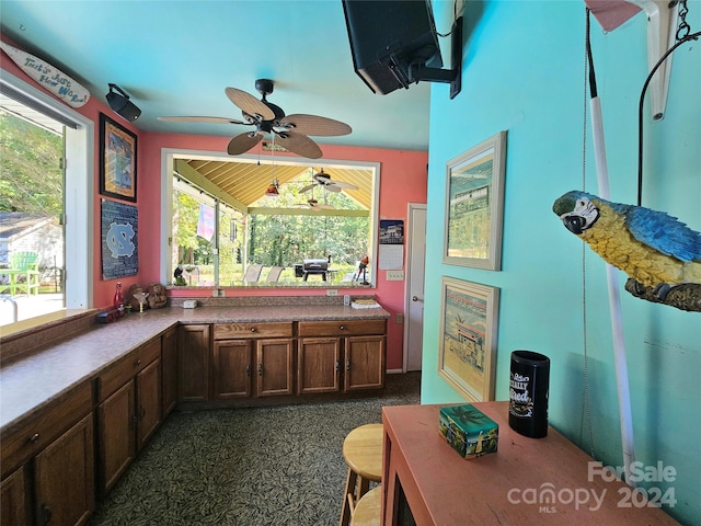 kitchen featuring ceiling fan