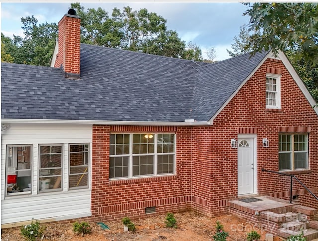 3980 Fish Pond Rd, Salisbury, NC 28146 - view of front of house with crawl space, a shingled roof, a chimney, and brick siding