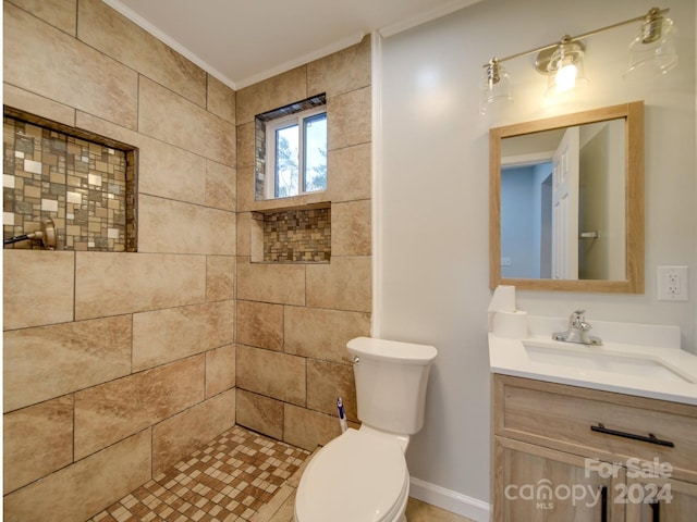 3980 Fish Pond Rd, Salisbury, NC 28146 - bathroom with vanity, ornamental molding, toilet, baseboards, and tiled shower