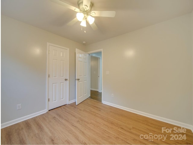 3980 Fish Pond Rd, Salisbury, NC 28146 - spare room featuring baseboards, light wood finished floors, and ceiling fan