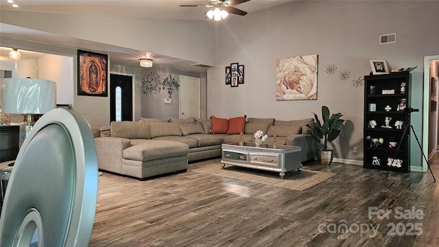 living room with ceiling fan, high vaulted ceiling, and hardwood / wood-style flooring