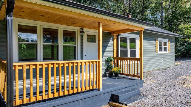 property entrance featuring covered porch