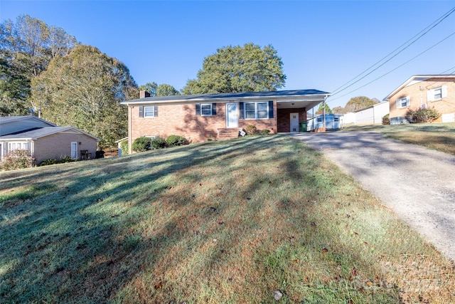 ranch-style home with a front lawn