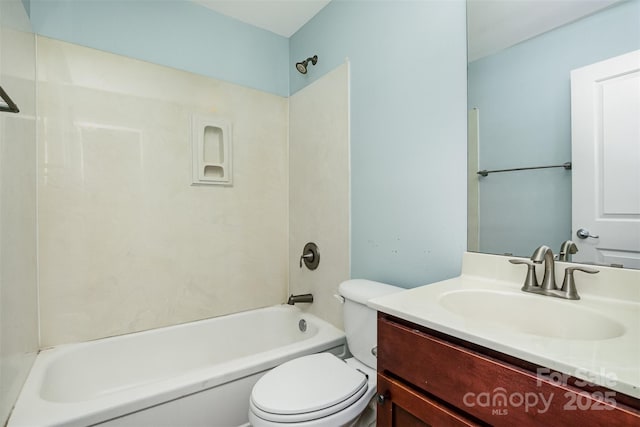 full bathroom with vanity, tub / shower combination, and toilet