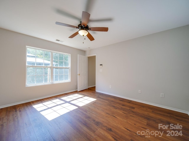 unfurnished room featuring hardwood / wood-style flooring and ceiling fan