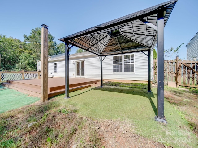 view of yard with a gazebo and a wooden deck