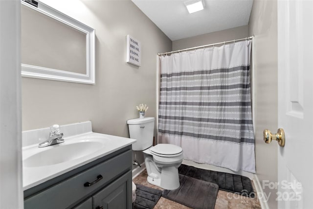 full bathroom featuring vanity, toilet, shower / bathtub combination with curtain, and a textured ceiling