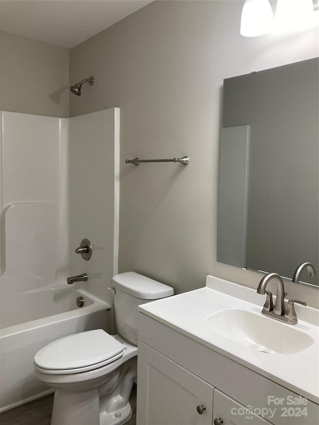 full bathroom with vanity, toilet, and shower / bathing tub combination