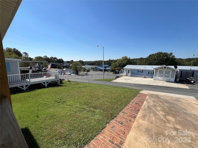 view of yard featuring a deck