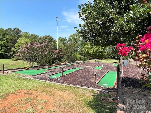 view of home's community featuring a yard