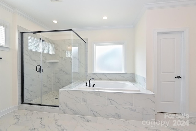 bathroom featuring crown molding, a healthy amount of sunlight, and plus walk in shower