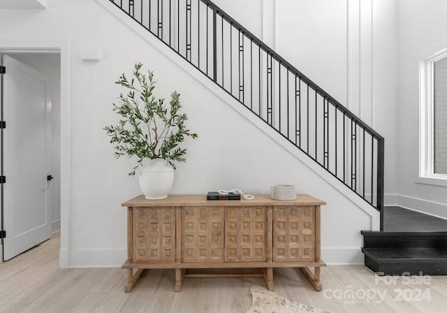 staircase featuring hardwood / wood-style flooring