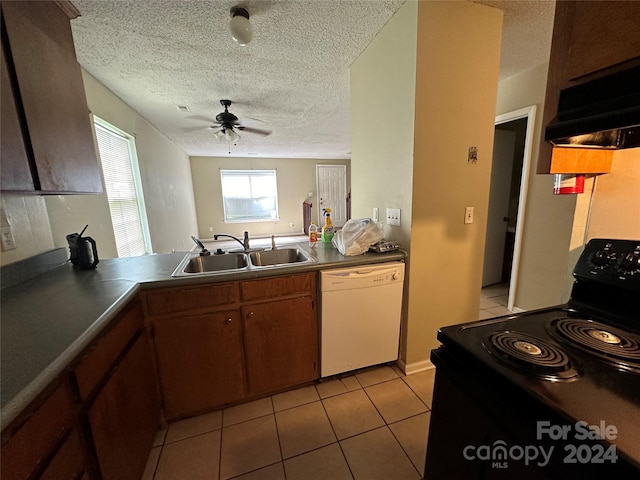 kitchen with light tile patterned flooring, sink, ventilation hood, white dishwasher, and black / electric stove