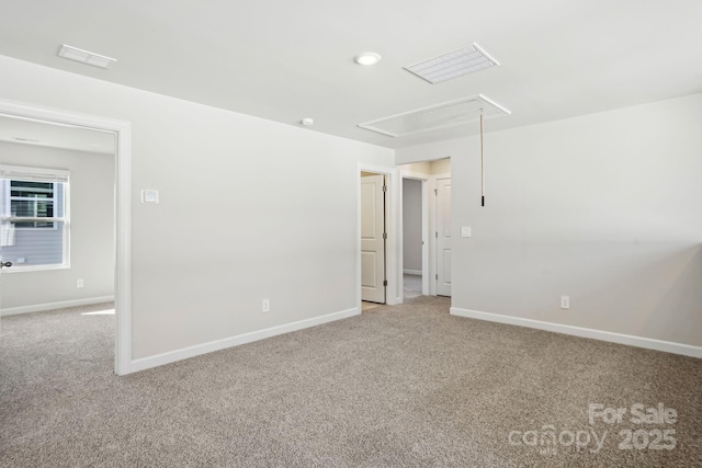 view of carpeted spare room