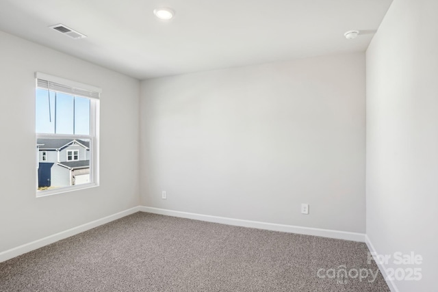 view of carpeted spare room