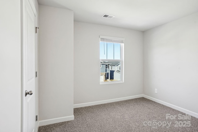 view of carpeted spare room