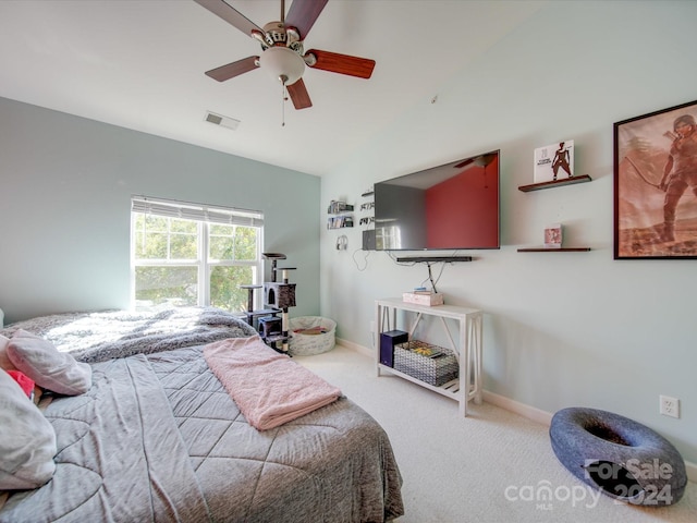 bedroom with ceiling fan and carpet floors