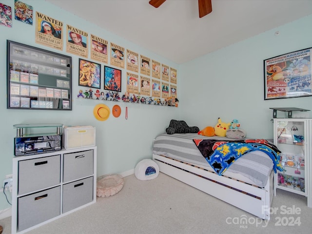 carpeted bedroom with ceiling fan