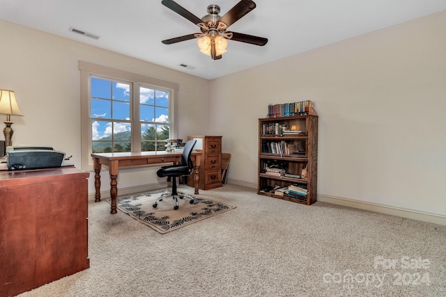 office with ceiling fan and carpet floors