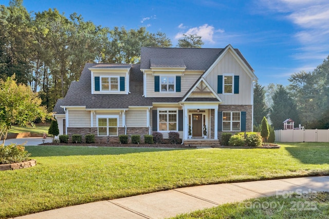 craftsman house featuring a front yard