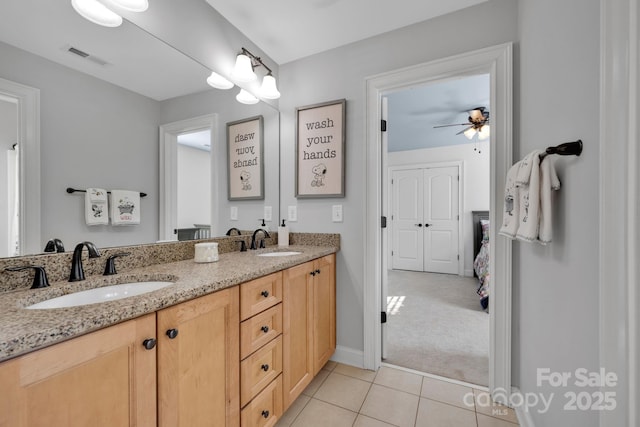 bathroom with vanity, tile patterned flooring, and ceiling fan