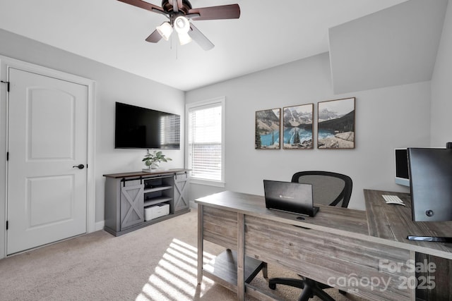 carpeted office with ceiling fan