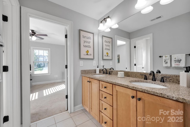 bathroom with vanity and tile patterned floors