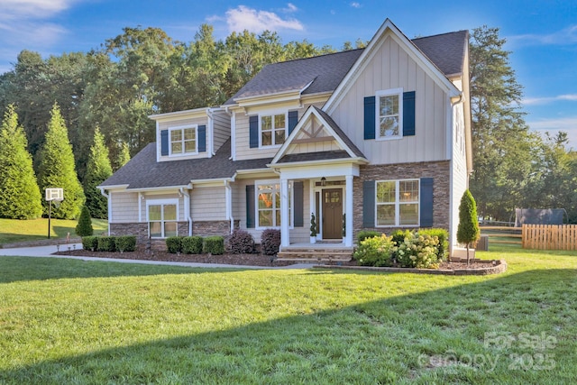 craftsman house with a front yard