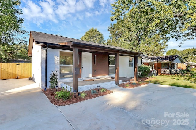 view of front of home featuring covered porch