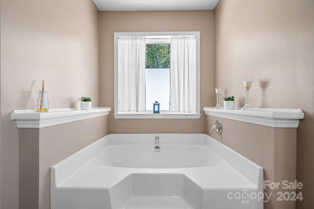 bathroom with a tub