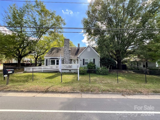 view of front of home with a front yard