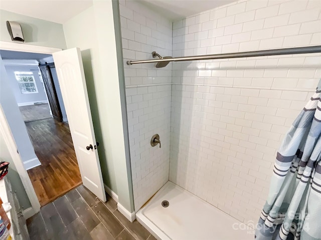 bathroom with a shower with curtain