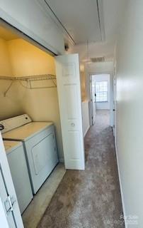 laundry area with washer and dryer