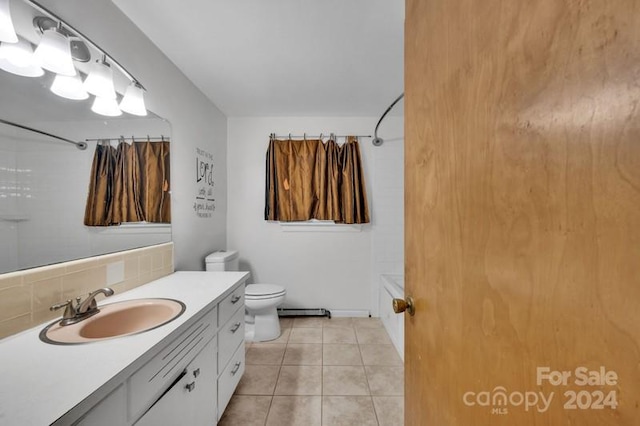 full bathroom featuring vanity, tile patterned flooring, backsplash, shower / tub combo, and toilet