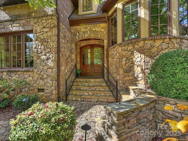 doorway to property with french doors