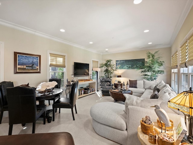 living room featuring ornamental molding and light colored carpet