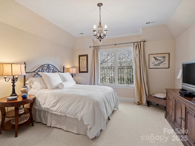 bedroom featuring light colored carpet, vaulted ceiling, and a chandelier