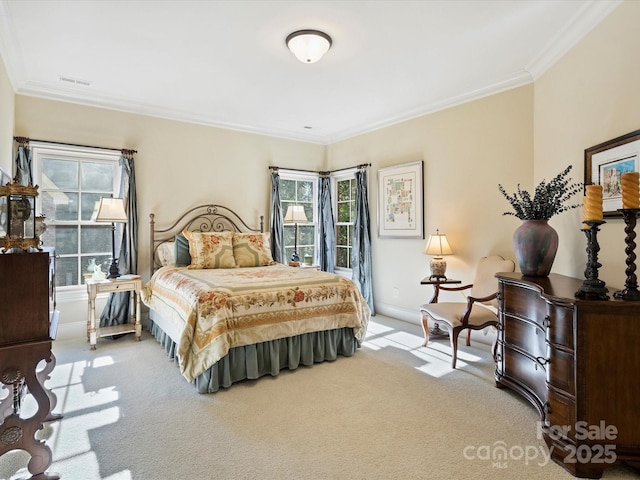 bedroom featuring light carpet and crown molding