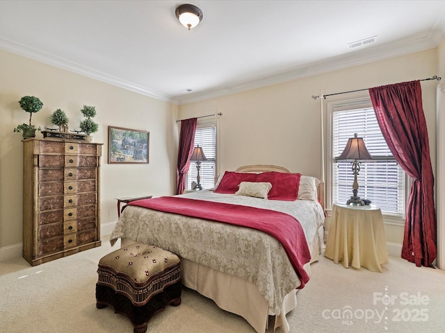 carpeted bedroom featuring multiple windows and ornamental molding