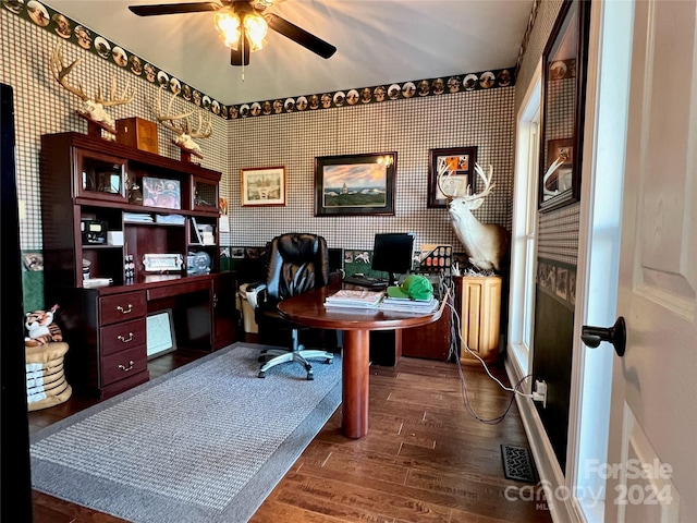 office area with dark wood-type flooring and ceiling fan