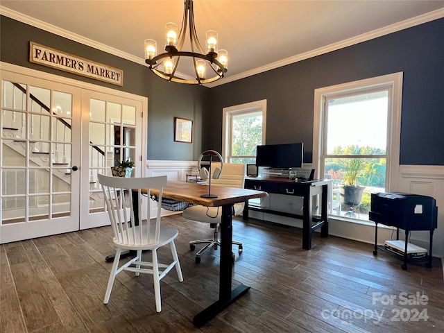 dining area with french doors, ornamental molding, a notable chandelier, and dark hardwood / wood-style flooring