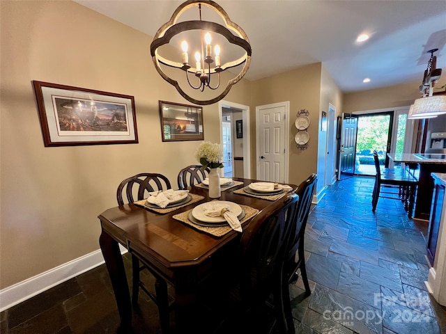 dining area with a notable chandelier